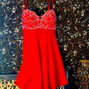cute red and pink flower slip dress. It’s a little see-through. No stains.